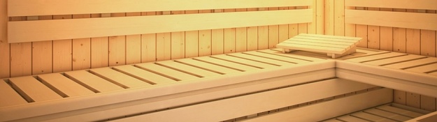 Dřevěná podpěrka hlavy na lavici v sauně